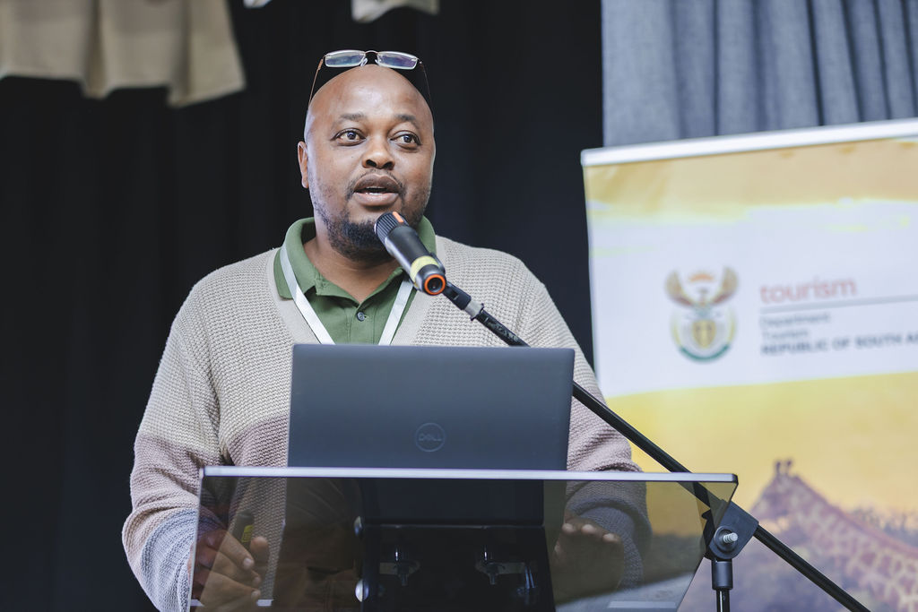 Speaker presenting on coastal and inland waterways tourism