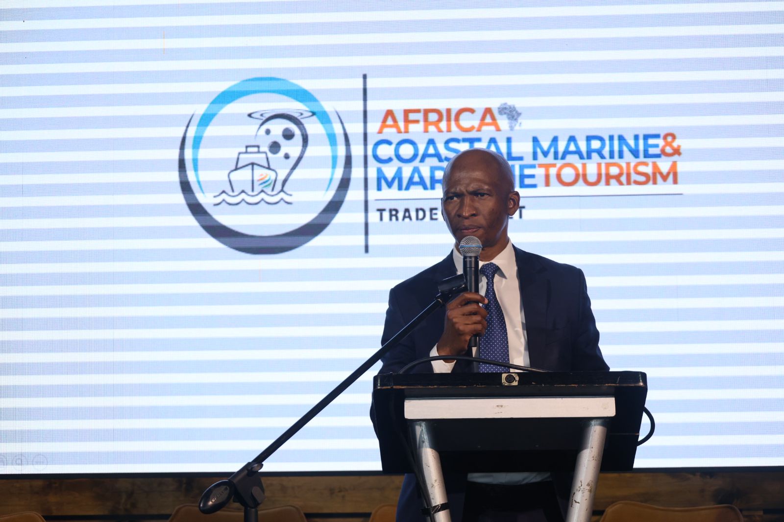 Speaker presenting on the Trade Market stage